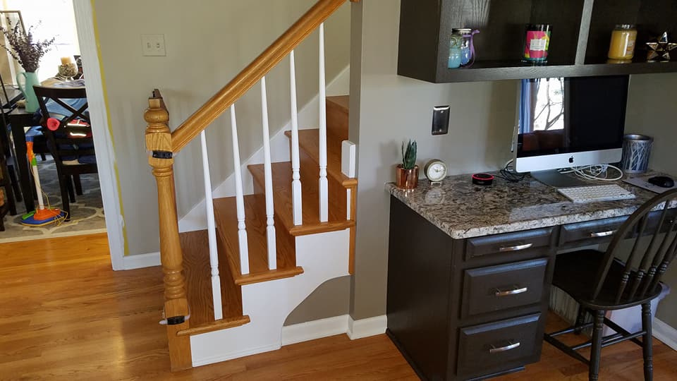 After painting services of dark brown wooden desk with a light-colored countertop